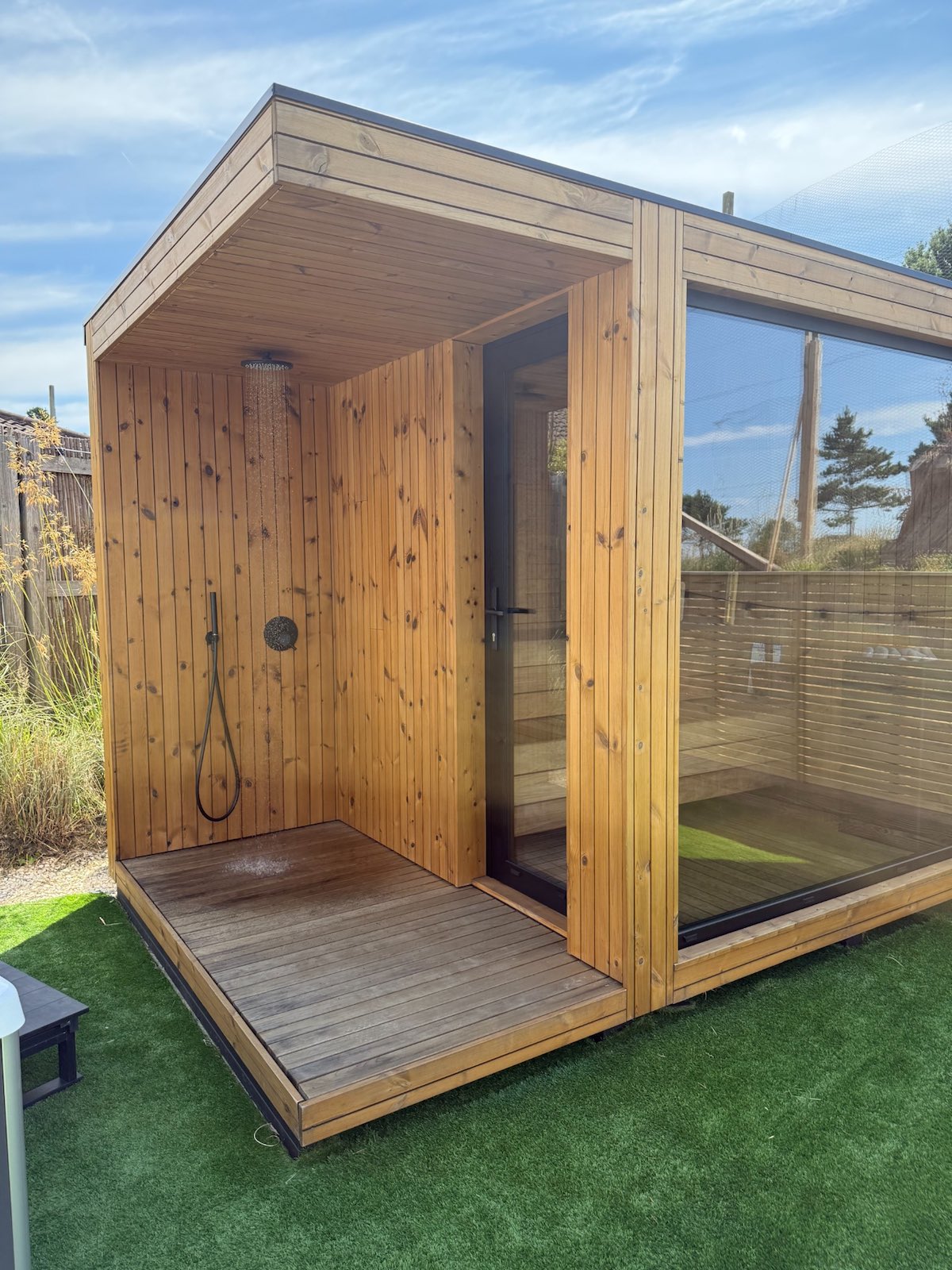 Timber sauna and outdoor shower in the Reset Garden